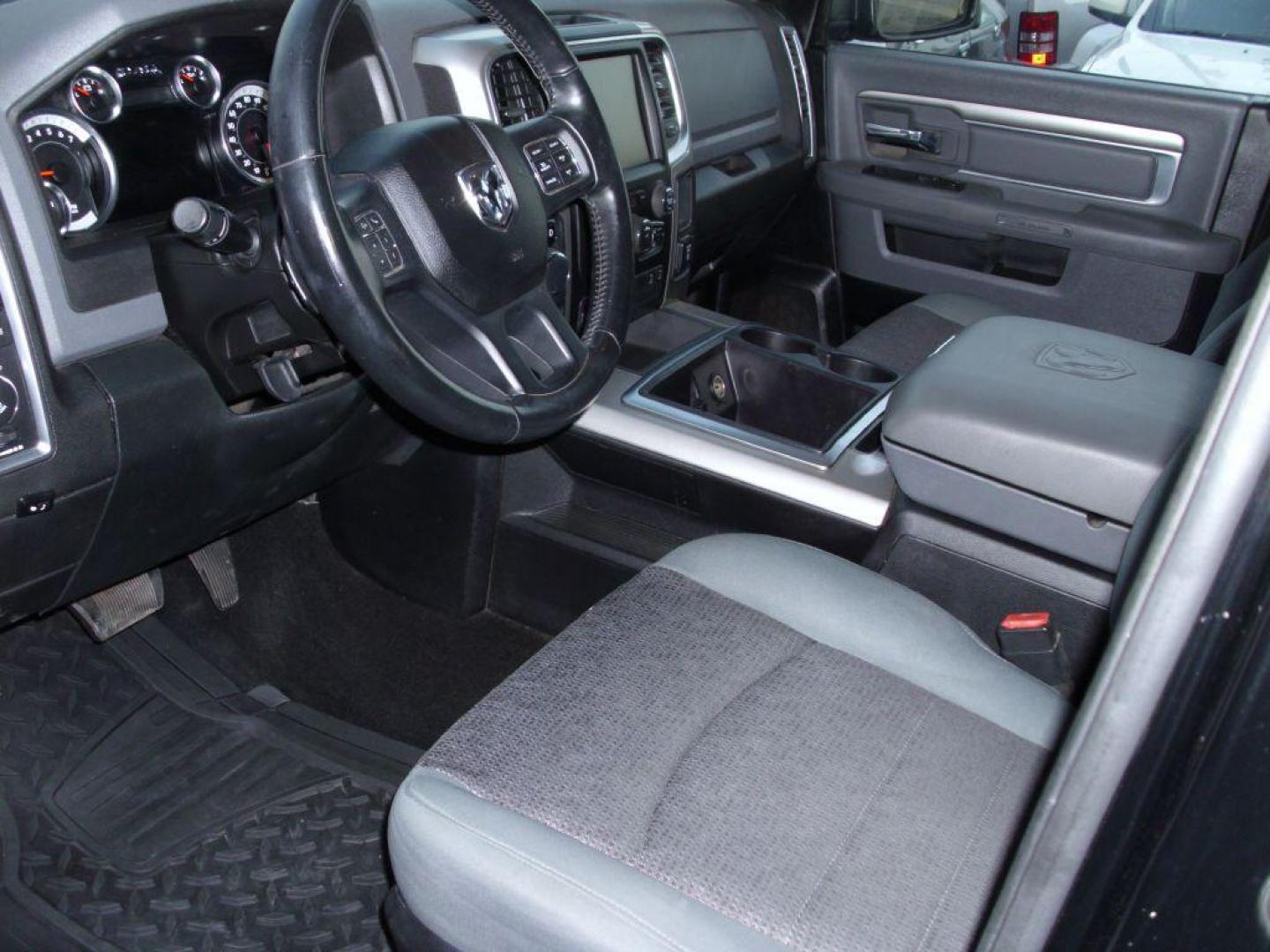 2014 BLACK RAM 1500 SLT (1C6RR6LT5ES) with an 5.7L engine, Automatic transmission, located at 2215 Harry Wurzbach Rd , San Antonio, TX, 78209, (208) 269-7240, 29.491415, -98.432098 - 20 INCH PLUS WHEELS! Alloy Wheels, Alpine Sound System, Automatic Transmission, ABS Brakes, Air Conditioning; Power Windows; Power Locks; Power Steering; Tilt Wheel; AM/FM CD/MP3; Satellite; AM/FM CD/DVD; Sentry Key; Keyless Entry; Available; Dual Air Bags Front and Sides; Active Belts; Crew Cab; Sh - Photo#11