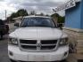 2009 WHITE DODGE DAKOTA SXT (1D3HW38P39S) with an 4.7L engine, Automatic transmission, located at 2215 Harry Wurzbach Rd , San Antonio, TX, 78209, (208) 269-7240, 29.491415, -98.432098 - 4X4- LOW MILEAGE WITH ALLOY WHEELS! Cloth Seats, Tow Hitch, Air Conditioning; Power Windows; Power Locks; Power Steering; Tilt Wheel; AM/FM CD/MP3; Satellite; Active keyless entry; Available; Dual Air Bags Front and Sides; Active Belts; Crew Cab; Regular Bed; All Wheel ABS; 1/2 Ton. We provide - Photo#3