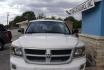 2009 WHITE DODGE DAKOTA SXT (1D3HW38P39S) with an 4.7L engine, Automatic transmission, located at 2215 Harry Wurzbach Rd , San Antonio, TX, 78209, (208) 269-7240, 29.491415, -98.432098 - 4X4- LOW MILEAGE WITH ALLOY WHEELS! Cloth Seats, Tow Hitch, Air Conditioning; Power Windows; Power Locks; Power Steering; Tilt Wheel; AM/FM CD/MP3; Satellite; Active keyless entry; Available; Dual Air Bags Front and Sides; Active Belts; Crew Cab; Regular Bed; All Wheel ABS; 1/2 Ton. We provide - Photo#4