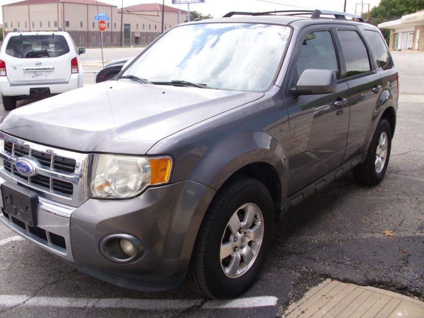 2012 GRAY FORD ESCAPE LIMITED (1FMCU0EG9CK) with an 3.0L engine, Automatic transmission, located at 2215 Harry Wurzbach Rd , San Antonio, TX, 78209, (208) 269-7240, 29.491415, -98.432098 - ONE OWNER - Front Seat Heaters, Bluetooth Technology, Alloy Wheels, Leather Seats, Sunroof(s), Air Conditioning; Power Windows; Power Locks; Power Steering; Tilt Wheel; AM/FM CD/MP3; Satellite; AM/FM CD/DVD; Sentry Key; Keyless Entry; Alarm; Available; Dual Front Airbags; Side Airbags; Head Airbags; - Photo#0