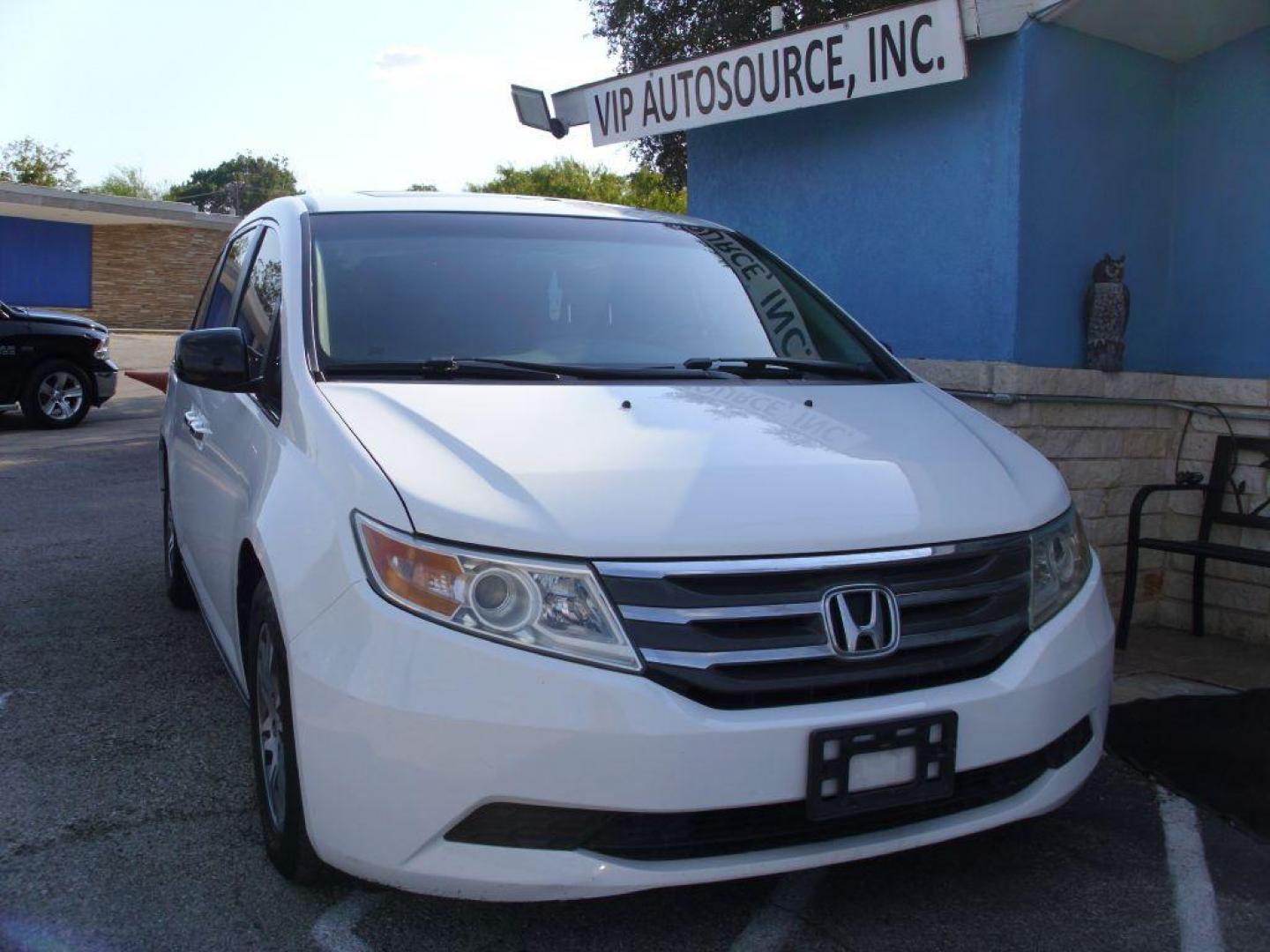 2012 WHITE HONDA ODYSSEY EXL (5FNRL5H69CB) with an 3.5L engine, Automatic transmission, located at 2215 Harry Wurzbach Rd , San Antonio, TX, 78209, (208) 269-7240, 29.491415, -98.432098 - PERFECT VAN FOR ROADTRIPS- ONE OWNER - FOLD AWAY THIRD ROW- FRONT SEAT HEATERS; Leather Seats; Rear Air Conditioning; Rear View Camera; Sunroof(s); Rear Sunshade; Power Hatch/Deck Lid; Air Conditioning; Power Windows; Power Locks; Power Steering; Tilt Wheel; AM/FM CD/MP3; Satellite; AM/FM CD/DVD; Im - Photo#1