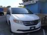 2012 WHITE HONDA ODYSSEY EXL (5FNRL5H69CB) with an 3.5L engine, Automatic transmission, located at 2215 Harry Wurzbach Rd , San Antonio, TX, 78209, (208) 269-7240, 29.491415, -98.432098 - PERFECT VAN FOR ROADTRIPS- ONE OWNER - FOLD AWAY THIRD ROW- FRONT SEAT HEATERS; Leather Seats; Rear Air Conditioning; Rear View Camera; Sunroof(s); Rear Sunshade; Power Hatch/Deck Lid; Air Conditioning; Power Windows; Power Locks; Power Steering; Tilt Wheel; AM/FM CD/MP3; Satellite; AM/FM CD/DVD; Im - Photo#1