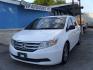 2012 WHITE HONDA ODYSSEY EXL (5FNRL5H69CB) with an 3.5L engine, Automatic transmission, located at 2215 Harry Wurzbach Rd , San Antonio, TX, 78209, (208) 269-7240, 29.491415, -98.432098 - PERFECT VAN FOR ROADTRIPS- ONE OWNER - FOLD AWAY THIRD ROW- FRONT SEAT HEATERS; Leather Seats; Rear Air Conditioning; Rear View Camera; Sunroof(s); Rear Sunshade; Power Hatch/Deck Lid; Air Conditioning; Power Windows; Power Locks; Power Steering; Tilt Wheel; AM/FM CD/MP3; Satellite; AM/FM CD/DVD; Im - Photo#4