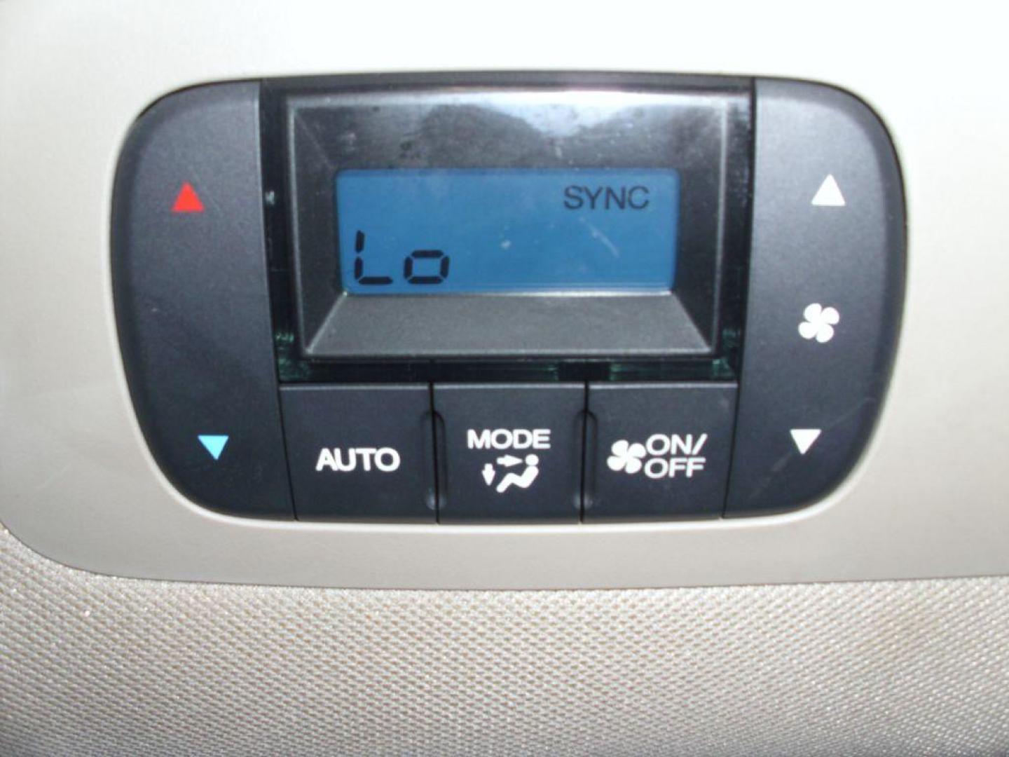 2012 WHITE HONDA ODYSSEY EXL (5FNRL5H69CB) with an 3.5L engine, Automatic transmission, located at 2215 Harry Wurzbach Rd , San Antonio, TX, 78209, (208) 269-7240, 29.491415, -98.432098 - PERFECT VAN FOR ROADTRIPS- ONE OWNER - FOLD AWAY THIRD ROW- FRONT SEAT HEATERS; Leather Seats; Rear Air Conditioning; Rear View Camera; Sunroof(s); Rear Sunshade; Power Hatch/Deck Lid; Air Conditioning; Power Windows; Power Locks; Power Steering; Tilt Wheel; AM/FM CD/MP3; Satellite; AM/FM CD/DVD; Im - Photo#12