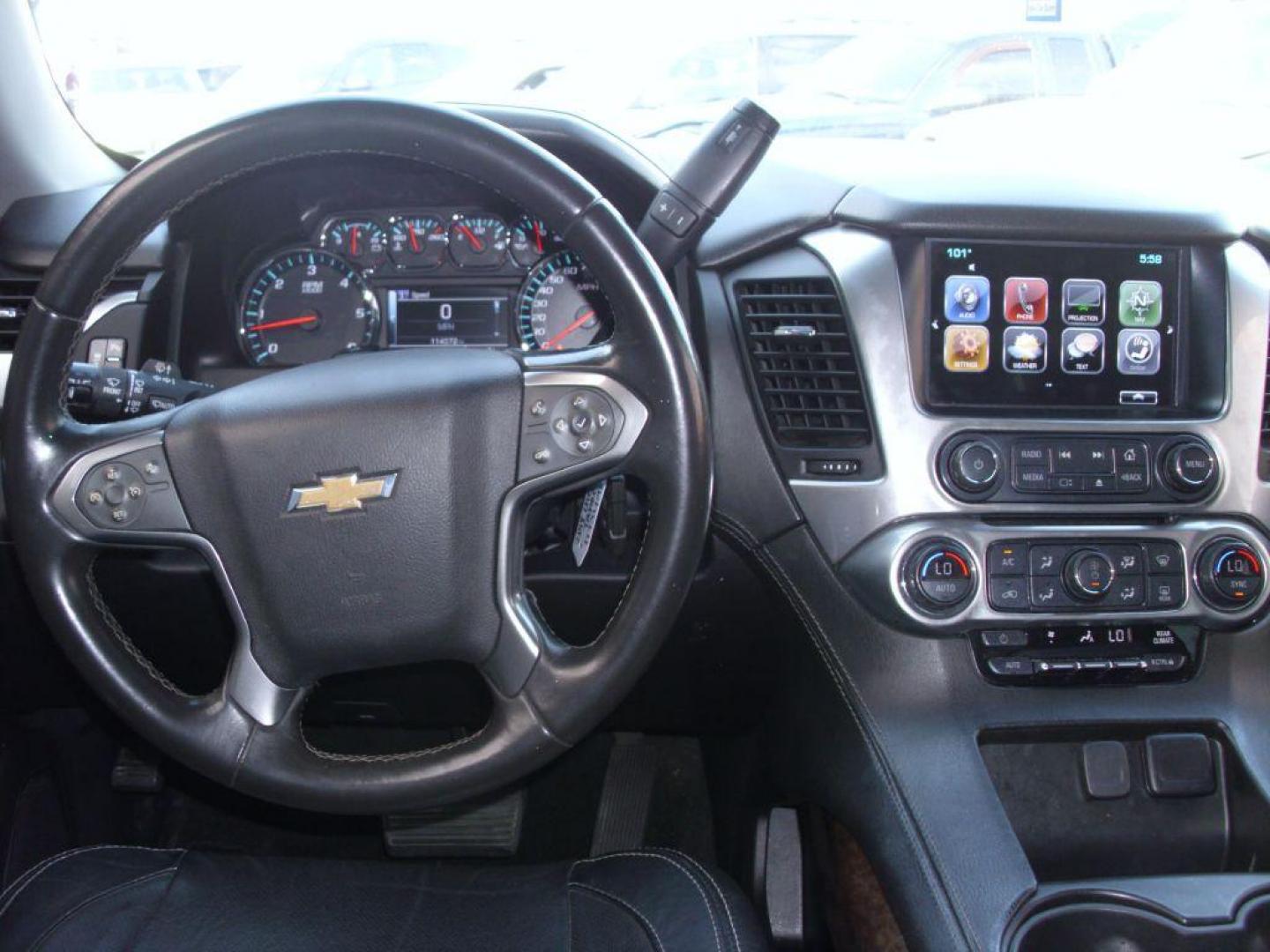2018 BLUE CHEVROLET TAHOE 1500 LS (1GNSCAKC9JR) with an 5.3L engine, Automatic transmission, located at 2215 Harry Wurzbach Rd , San Antonio, TX, 78209, (208) 269-7240, 29.491415, -98.432098 - GREAT SUV FOR ROAD TRIPS WITH FOLD AWAY THIRD ROW ! ABS Brakes; Air Conditioning; Alloy Wheels; AM/FM Stereo; Android Auto; Apple CarPlay; Automatic Transmission; Auxiliary Audio Input; Bluetooth Technology; CD Audio; Cruise Control; Lane Departure Warning; Leather Seats; Navigation System; Overhead - Photo#10