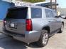 2018 BLUE CHEVROLET TAHOE 1500 LS (1GNSCAKC9JR) with an 5.3L engine, Automatic transmission, located at 2215 Harry Wurzbach Rd , San Antonio, TX, 78209, (208) 269-7240, 29.491415, -98.432098 - GREAT SUV FOR ROAD TRIPS WITH FOLD AWAY THIRD ROW ! ABS Brakes; Air Conditioning; Alloy Wheels; AM/FM Stereo; Android Auto; Apple CarPlay; Automatic Transmission; Auxiliary Audio Input; Bluetooth Technology; CD Audio; Cruise Control; Lane Departure Warning; Leather Seats; Navigation System; Overhead - Photo#7