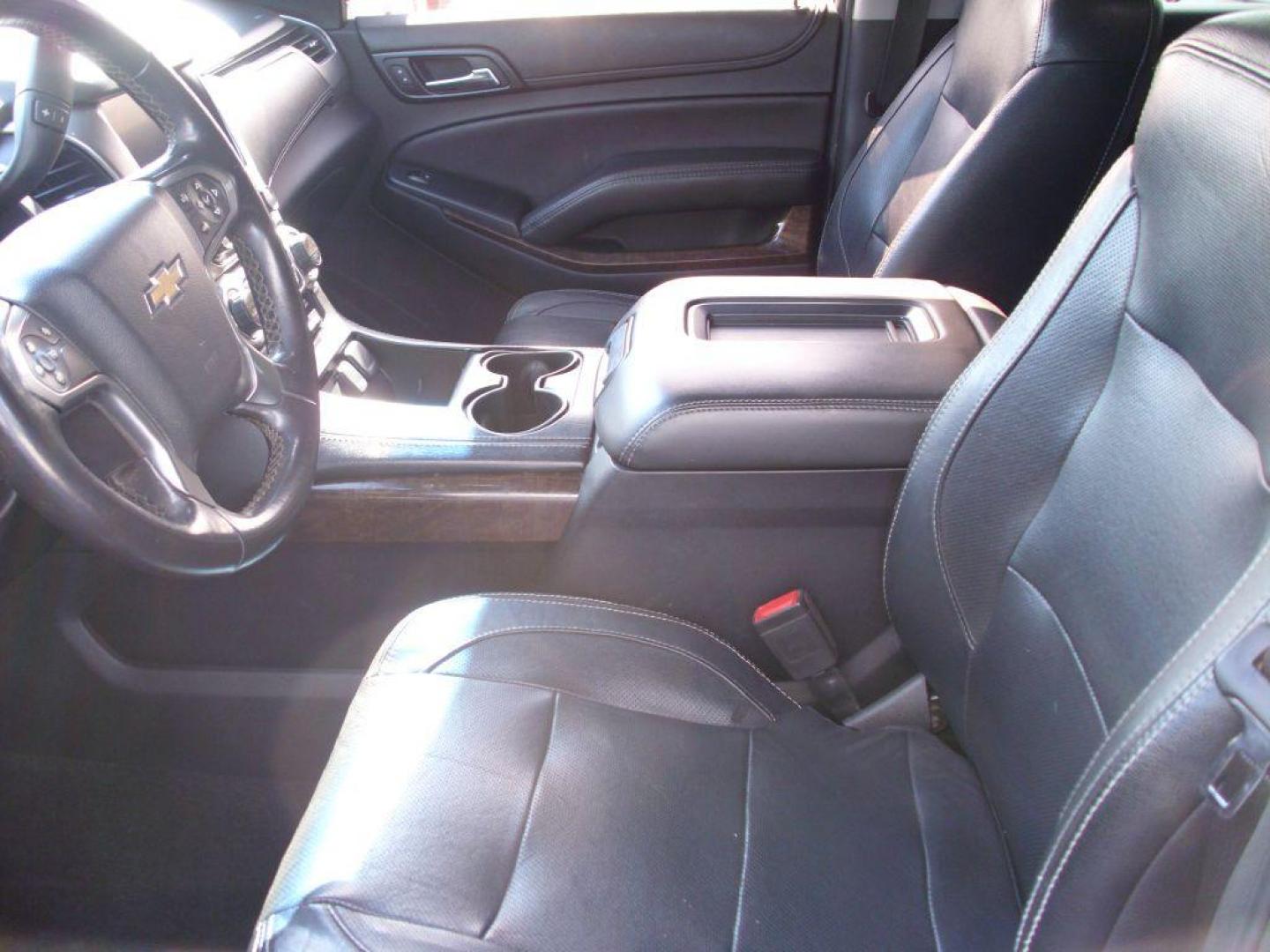 2018 BLUE CHEVROLET TAHOE 1500 LS (1GNSCAKC9JR) with an 5.3L engine, Automatic transmission, located at 2215 Harry Wurzbach Rd , San Antonio, TX, 78209, (208) 269-7240, 29.491415, -98.432098 - GREAT SUV FOR ROAD TRIPS WITH FOLD AWAY THIRD ROW ! ABS Brakes; Air Conditioning; Alloy Wheels; AM/FM Stereo; Android Auto; Apple CarPlay; Automatic Transmission; Auxiliary Audio Input; Bluetooth Technology; CD Audio; Cruise Control; Lane Departure Warning; Leather Seats; Navigation System; Overhead - Photo#12