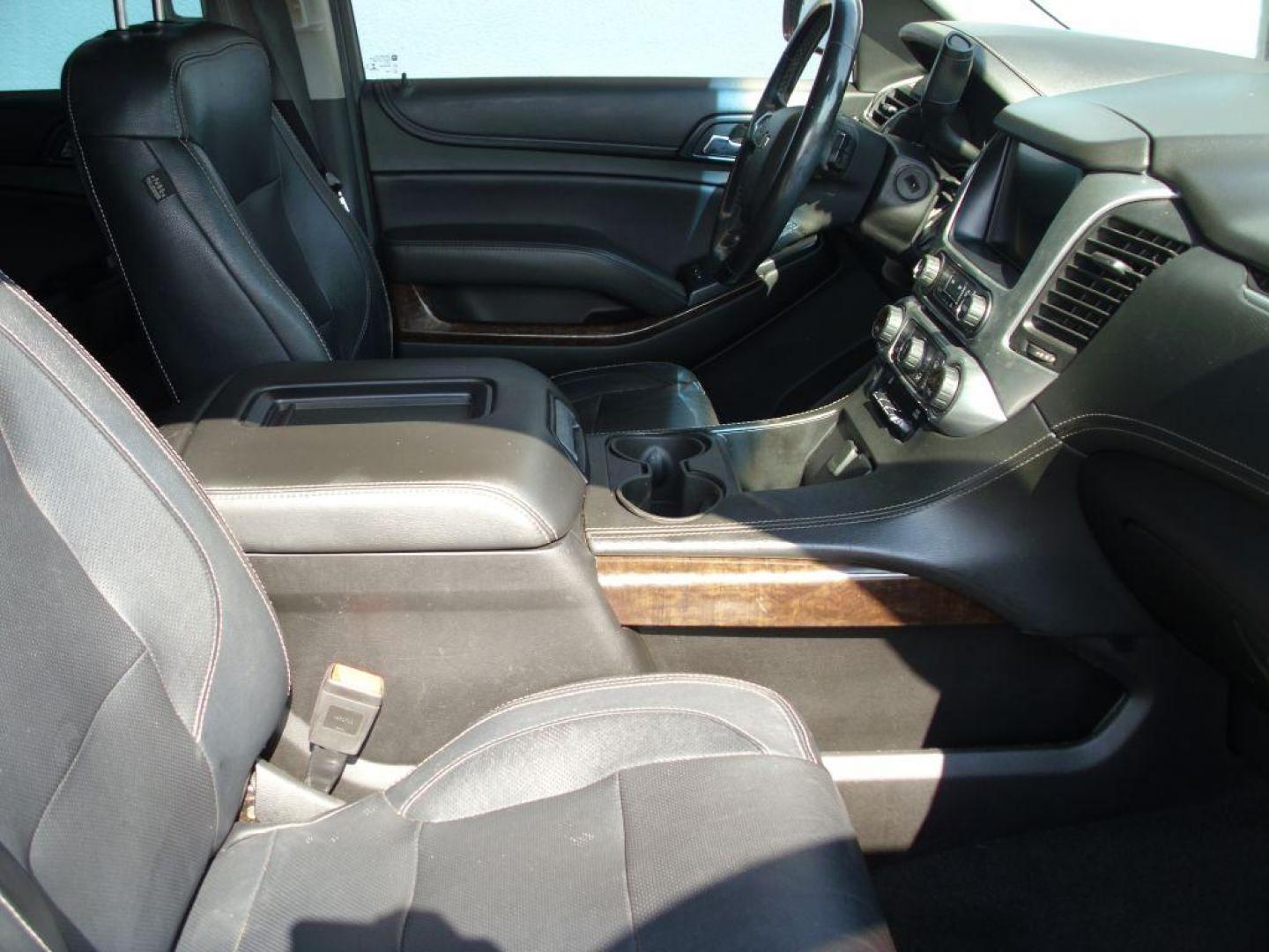 2018 BLUE CHEVROLET TAHOE 1500 LS (1GNSCAKC9JR) with an 5.3L engine, Automatic transmission, located at 2215 Harry Wurzbach Rd , San Antonio, TX, 78209, (208) 269-7240, 29.491415, -98.432098 - GREAT SUV FOR ROAD TRIPS WITH FOLD AWAY THIRD ROW ! ABS Brakes; Air Conditioning; Alloy Wheels; AM/FM Stereo; Android Auto; Apple CarPlay; Automatic Transmission; Auxiliary Audio Input; Bluetooth Technology; CD Audio; Cruise Control; Lane Departure Warning; Leather Seats; Navigation System; Overhead - Photo#21