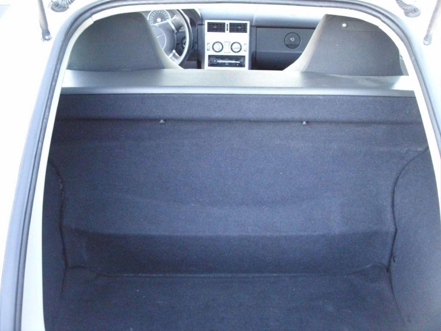 2006 WHITE CHRYSLER CROSSFIRE LIMITED (1C3AN69L76X) with an 3.2L engine, Automatic transmission, located at 2215 Harry Wurzbach Rd , San Antonio, TX, 78209, (208) 269-7240, 29.491415, -98.432098 - Photo#11