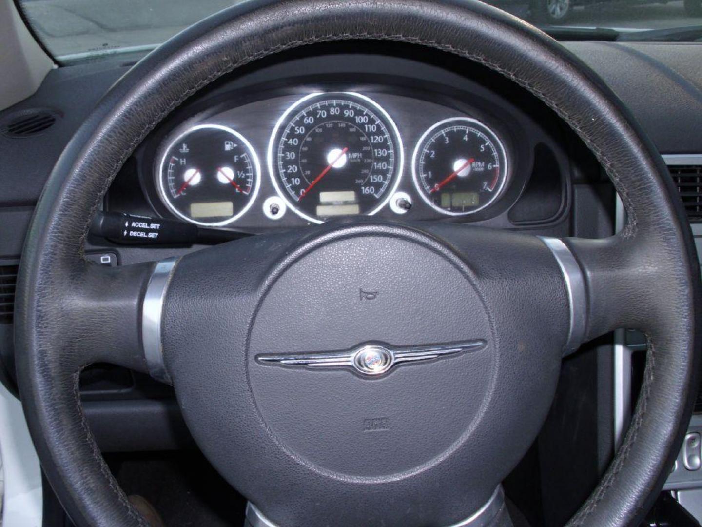 2006 WHITE CHRYSLER CROSSFIRE LIMITED (1C3AN69L76X) with an 3.2L engine, Automatic transmission, located at 2215 Harry Wurzbach Rd , San Antonio, TX, 78209, (208) 269-7240, 29.491415, -98.432098 - Photo#12