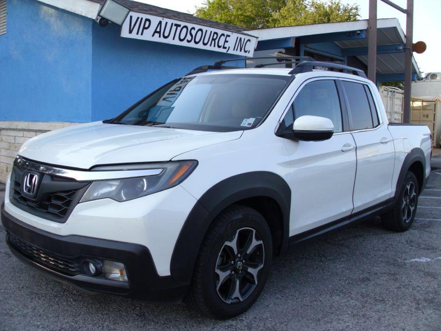 2017 WHITE HONDA RIDGELINE RTL (5FPYK2F59HB) with an 3.5L engine, Automatic transmission, located at 2215 Harry Wurzbach Rd , San Antonio, TX, 78209, (208) 269-7240, 29.491415, -98.432098 - ABS Brakes; Air Conditioning; Alloy Wheels; AM/FM Stereo; Automatic Transmission; Auxiliary Audio Input; Bed Liner; Bluetooth Technology; Cruise Control; Front Seat Heaters; Full Roof Rack; Leather Seats; Overhead Airbags; Parking Sensors; Power Locks; Power Mirrors; Power Seat(s); Power Windows; Re - Photo#0