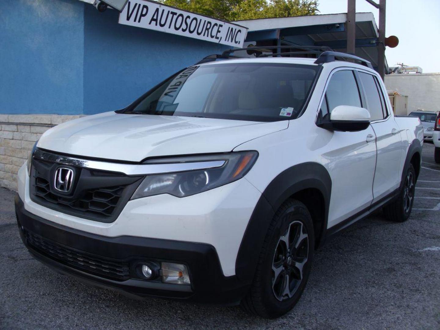 2017 WHITE HONDA RIDGELINE RTL (5FPYK2F59HB) with an 3.5L engine, Automatic transmission, located at 2215 Harry Wurzbach Rd , San Antonio, TX, 78209, (208) 269-7240, 29.491415, -98.432098 - ABS Brakes; Air Conditioning; Alloy Wheels; AM/FM Stereo; Automatic Transmission; Auxiliary Audio Input; Bed Liner; Bluetooth Technology; Cruise Control; Front Seat Heaters; Full Roof Rack; Leather Seats; Overhead Airbags; Parking Sensors; Power Locks; Power Mirrors; Power Seat(s); Power Windows; Re - Photo#1