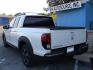 2017 WHITE HONDA RIDGELINE RTL (5FPYK2F59HB) with an 3.5L engine, Automatic transmission, located at 2215 Harry Wurzbach Rd , San Antonio, TX, 78209, (208) 269-7240, 29.491415, -98.432098 - ABS Brakes; Air Conditioning; Alloy Wheels; AM/FM Stereo; Automatic Transmission; Auxiliary Audio Input; Bed Liner; Bluetooth Technology; Cruise Control; Front Seat Heaters; Full Roof Rack; Leather Seats; Overhead Airbags; Parking Sensors; Power Locks; Power Mirrors; Power Seat(s); Power Windows; Re - Photo#5