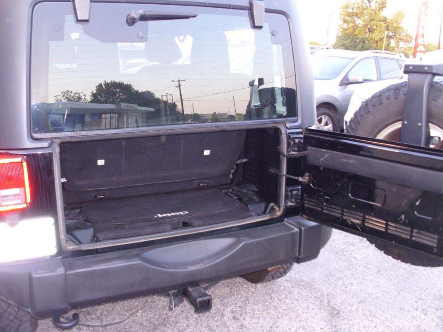 2014 BLACK JEEP WRANGLER SPORT (1C4AJWAG0EL) with an 3.6L engine, Automatic transmission, located at 2215 Harry Wurzbach Rd , San Antonio, TX, 78209, (208) 269-7240, 29.491415, -98.432098 - PERFECT FOR ADVENTURES! ONE OWNER! 4WD/AWD WITH ALLOY WHEELS! SPECIAL EDITION; Tow Hitch; Traction Control; Running Boards; Remote Start; Hard Top; Cloth Seats; Rear Defroster; Air Conditioning, ABS Brakes, Automatic Transmission; Power Steering; Tilt Wheel; AM/FM CD/MP3; AM/FM CD/DVD; Passive sentr - Photo#21