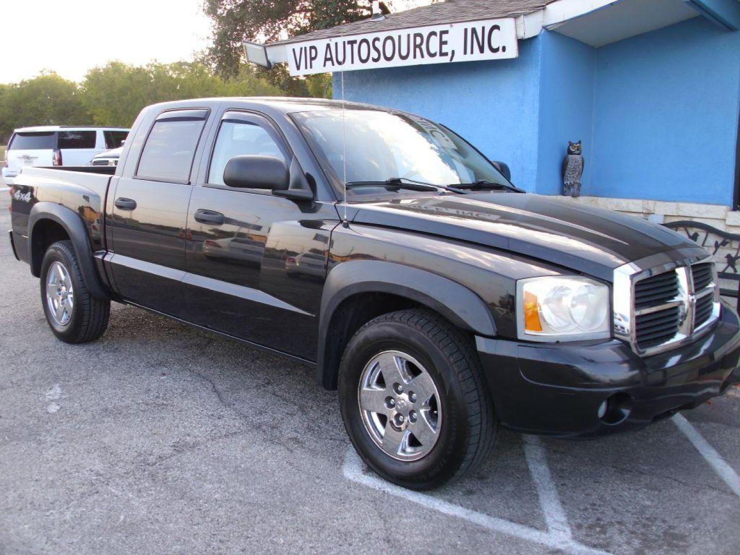 2006 BLACK DODGE DAKOTA QUAD SLT (1D7HW48N36S) with an 4.7L engine, Automatic transmission, located at 2215 Harry Wurzbach Rd , San Antonio, TX, 78209, (208) 269-7240, 29.491415, -98.432098 - GREAT TRUCK- 4X4 WITH AUTOMATIC TRANSMISSION; ABS Brakes; Alloy Wheels; Bed Liner; Cloth Seats; Cruise Control; Power Locks; CD; Passive sentry key; Available; Dual Front Air Bag; Active Belts; Tow Hitch; Crew Cab; Short Bed; All Wheel ABS; 1/2 Ton. ** WE DO NOT OFFER BUY HERE PAY HERE FINAN - Photo#1