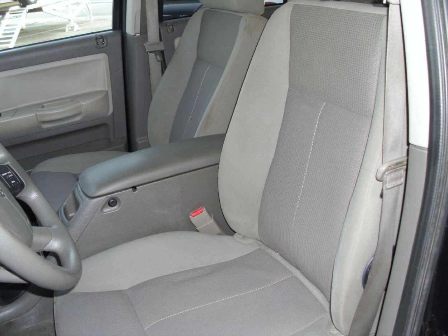 2006 BLACK DODGE DAKOTA QUAD SLT (1D7HW48N36S) with an 4.7L engine, Automatic transmission, located at 2215 Harry Wurzbach Rd , San Antonio, TX, 78209, (208) 269-7240, 29.491415, -98.432098 - GREAT TRUCK- 4X4 WITH AUTOMATIC TRANSMISSION; ABS Brakes; Alloy Wheels; Bed Liner; Cloth Seats; Cruise Control; Power Locks; CD; Passive sentry key; Available; Dual Front Air Bag; Active Belts; Tow Hitch; Crew Cab; Short Bed; All Wheel ABS; 1/2 Ton. ** WE DO NOT OFFER BUY HERE PAY HERE FINAN - Photo#8