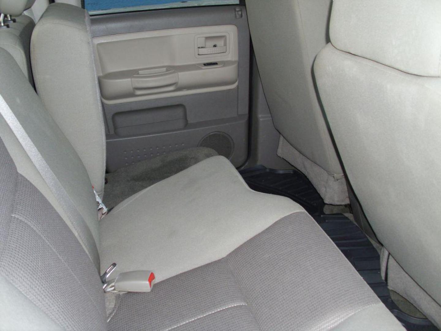 2006 BLACK DODGE DAKOTA QUAD SLT (1D7HW48N36S) with an 4.7L engine, Automatic transmission, located at 2215 Harry Wurzbach Rd , San Antonio, TX, 78209, (208) 269-7240, 29.491415, -98.432098 - GREAT TRUCK- 4X4 WITH AUTOMATIC TRANSMISSION; ABS Brakes; Alloy Wheels; Bed Liner; Cloth Seats; Cruise Control; Power Locks; CD; Passive sentry key; Available; Dual Front Air Bag; Active Belts; Tow Hitch; Crew Cab; Short Bed; All Wheel ABS; 1/2 Ton. ** WE DO NOT OFFER BUY HERE PAY HERE FINAN - Photo#11