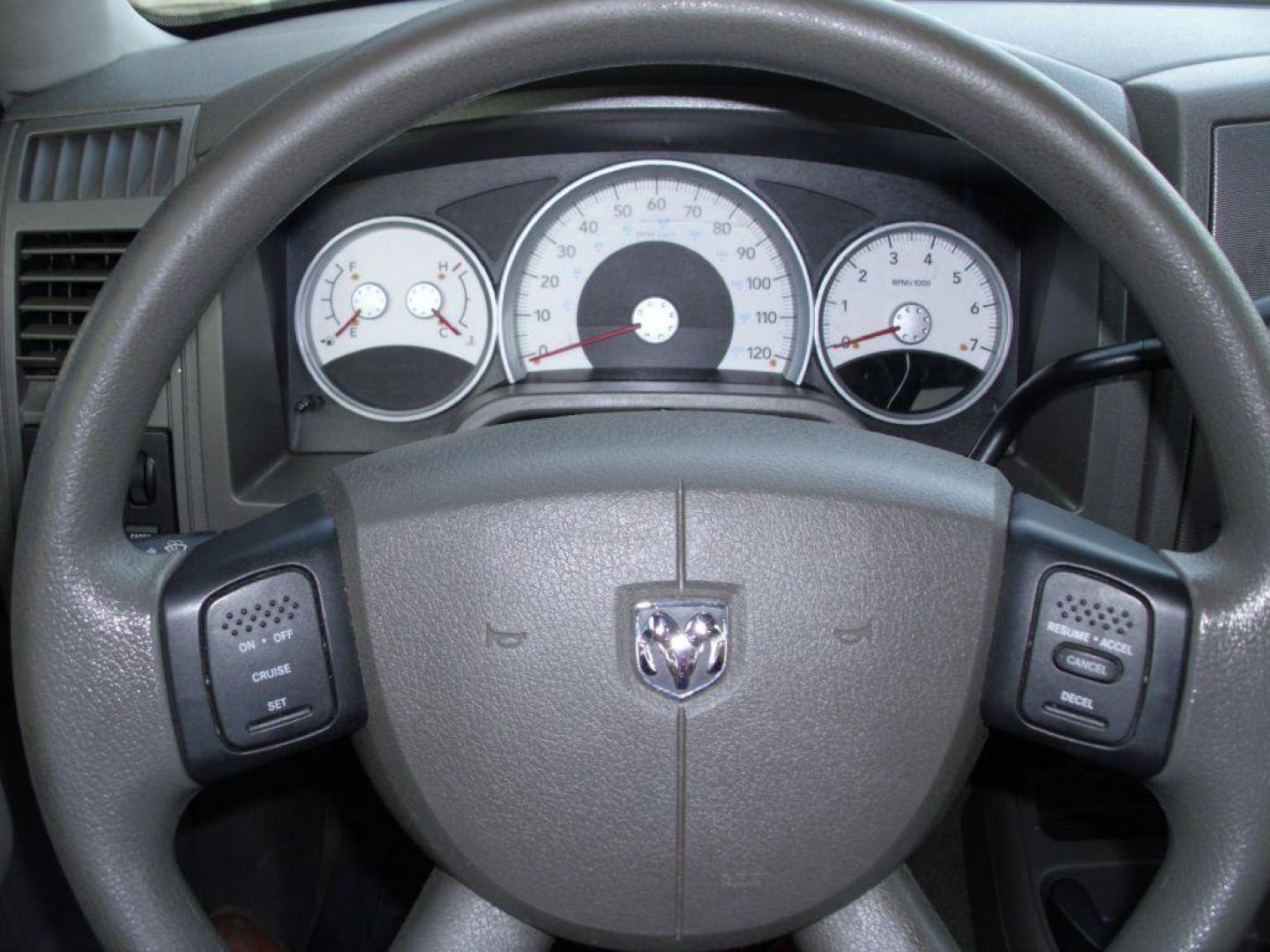 2006 BLACK DODGE DAKOTA QUAD SLT (1D7HW48N36S) with an 4.7L engine, Automatic transmission, located at 2215 Harry Wurzbach Rd , San Antonio, TX, 78209, (208) 269-7240, 29.491415, -98.432098 - GREAT TRUCK- 4X4 WITH AUTOMATIC TRANSMISSION; ABS Brakes; Alloy Wheels; Bed Liner; Cloth Seats; Cruise Control; Power Locks; CD; Passive sentry key; Available; Dual Front Air Bag; Active Belts; Tow Hitch; Crew Cab; Short Bed; All Wheel ABS; 1/2 Ton. ** WE DO NOT OFFER BUY HERE PAY HERE FINAN - Photo#14