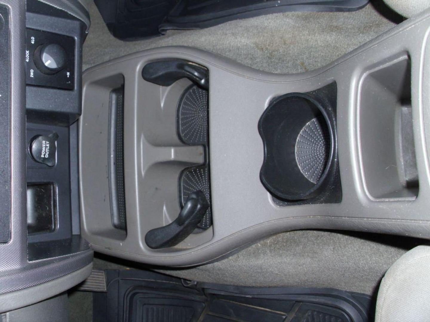 2006 BLACK DODGE DAKOTA QUAD SLT (1D7HW48N36S) with an 4.7L engine, Automatic transmission, located at 2215 Harry Wurzbach Rd , San Antonio, TX, 78209, (208) 269-7240, 29.491415, -98.432098 - GREAT TRUCK- 4X4 WITH AUTOMATIC TRANSMISSION; ABS Brakes; Alloy Wheels; Bed Liner; Cloth Seats; Cruise Control; Power Locks; CD; Passive sentry key; Available; Dual Front Air Bag; Active Belts; Tow Hitch; Crew Cab; Short Bed; All Wheel ABS; 1/2 Ton. ** WE DO NOT OFFER BUY HERE PAY HERE FINAN - Photo#16