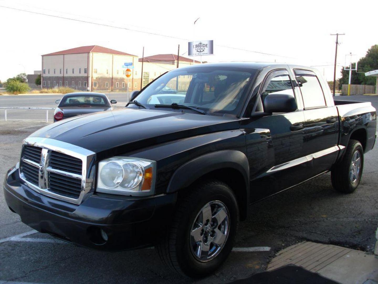 2006 BLACK DODGE DAKOTA QUAD SLT (1D7HW48N36S) with an 4.7L engine, Automatic transmission, located at 2215 Harry Wurzbach Rd , San Antonio, TX, 78209, (208) 269-7240, 29.491415, -98.432098 - GREAT TRUCK- 4X4 WITH AUTOMATIC TRANSMISSION; ABS Brakes; Alloy Wheels; Bed Liner; Cloth Seats; Cruise Control; Power Locks; CD; Passive sentry key; Available; Dual Front Air Bag; Active Belts; Tow Hitch; Crew Cab; Short Bed; All Wheel ABS; 1/2 Ton. ** WE DO NOT OFFER BUY HERE PAY HERE FINAN - Photo#18