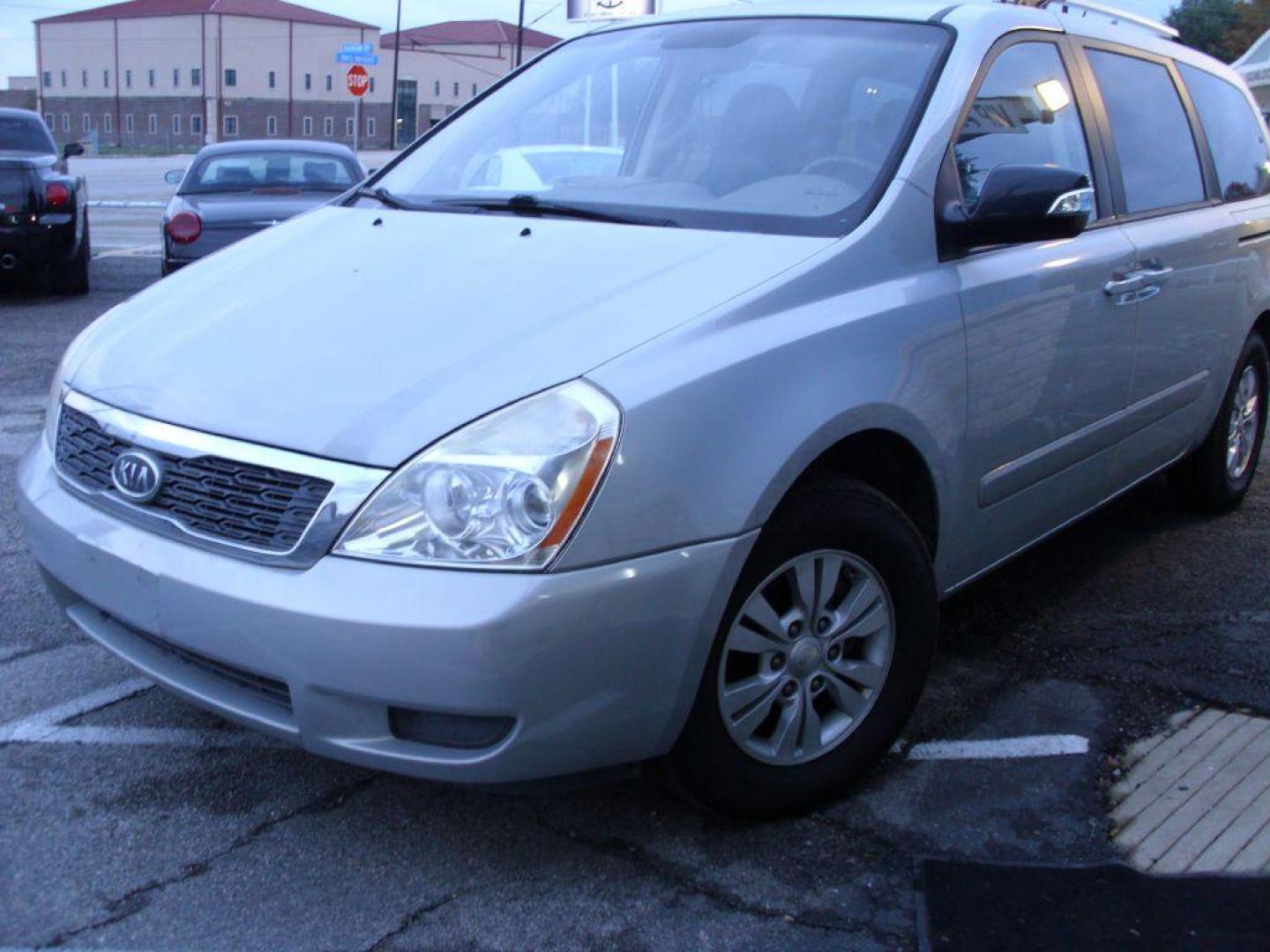 2012 TAN KIA SEDONA LX (KNDMG4C79C6) with an 3.5L engine, Automatic transmission, located at 2215 Harry Wurzbach Rd , San Antonio, TX, 78209, (208) 269-7240, 29.491415, -98.432098 - PERFECT VAN FOR ROADTRIPS- THIRD ROW SEAT! ABS Brakes; Air Conditioning; AM/FM Stereo; Automatic Transmission; Auxiliary Audio Input; Bluetooth Technology; CD Audio; Cloth Seats; Cruise Control; Fold-Away Third Row; Overhead Airbags; Parking Sensors; Power Locks; Power Mirrors; Power Windows; Quad S - Photo#1