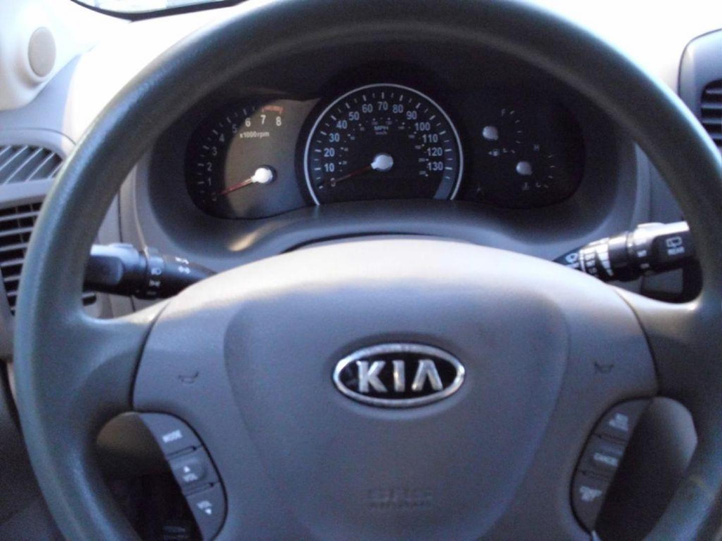 2012 TAN KIA SEDONA LX (KNDMG4C79C6) with an 3.5L engine, Automatic transmission, located at 2215 Harry Wurzbach Rd , San Antonio, TX, 78209, (208) 269-7240, 29.491415, -98.432098 - PERFECT VAN FOR ROADTRIPS- THIRD ROW SEAT! ABS Brakes; Air Conditioning; AM/FM Stereo; Automatic Transmission; Auxiliary Audio Input; Bluetooth Technology; CD Audio; Cloth Seats; Cruise Control; Fold-Away Third Row; Overhead Airbags; Parking Sensors; Power Locks; Power Mirrors; Power Windows; Quad S - Photo#14