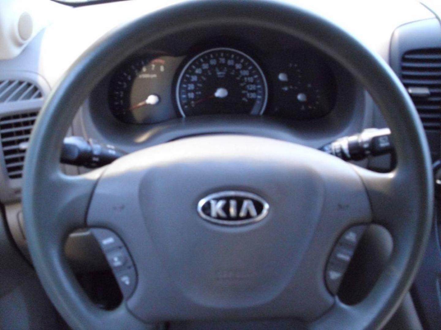 2012 TAN KIA SEDONA LX (KNDMG4C79C6) with an 3.5L engine, Automatic transmission, located at 2215 Harry Wurzbach Rd , San Antonio, TX, 78209, (208) 269-7240, 29.491415, -98.432098 - PERFECT VAN FOR ROADTRIPS- THIRD ROW SEAT! ABS Brakes; Air Conditioning; AM/FM Stereo; Automatic Transmission; Auxiliary Audio Input; Bluetooth Technology; CD Audio; Cloth Seats; Cruise Control; Fold-Away Third Row; Overhead Airbags; Parking Sensors; Power Locks; Power Mirrors; Power Windows; Quad S - Photo#15