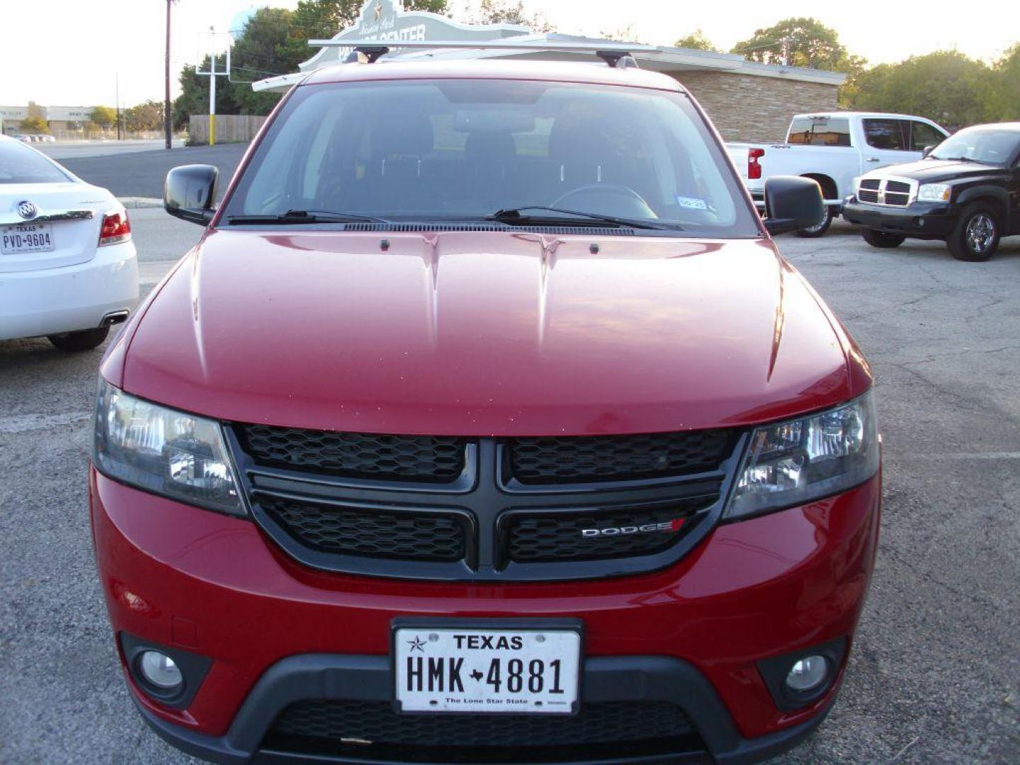2016 RED DODGE JOURNEY SXT (3C4PDCBB4GT) with an 2.4L engine, Automatic transmission, located at 2215 Harry Wurzbach Rd , San Antonio, TX, 78209, (208) 269-7240, 29.491415, -98.432098 - ONE OWNER- THIRD ROW SEATING; Roof Rack, Traction Control; Air Conditioning; Power Door Locks; Power Steering; AM/FM Stereo; Alloy Wheels; Cruise Control; Side Air Bags; Power Seat; Power Windows; Dual Air Bags ** WE DO NOT OFFER BUY HERE PAY HERE FINANCING. or Sub-Prime credit rebuilding** - Photo#1
