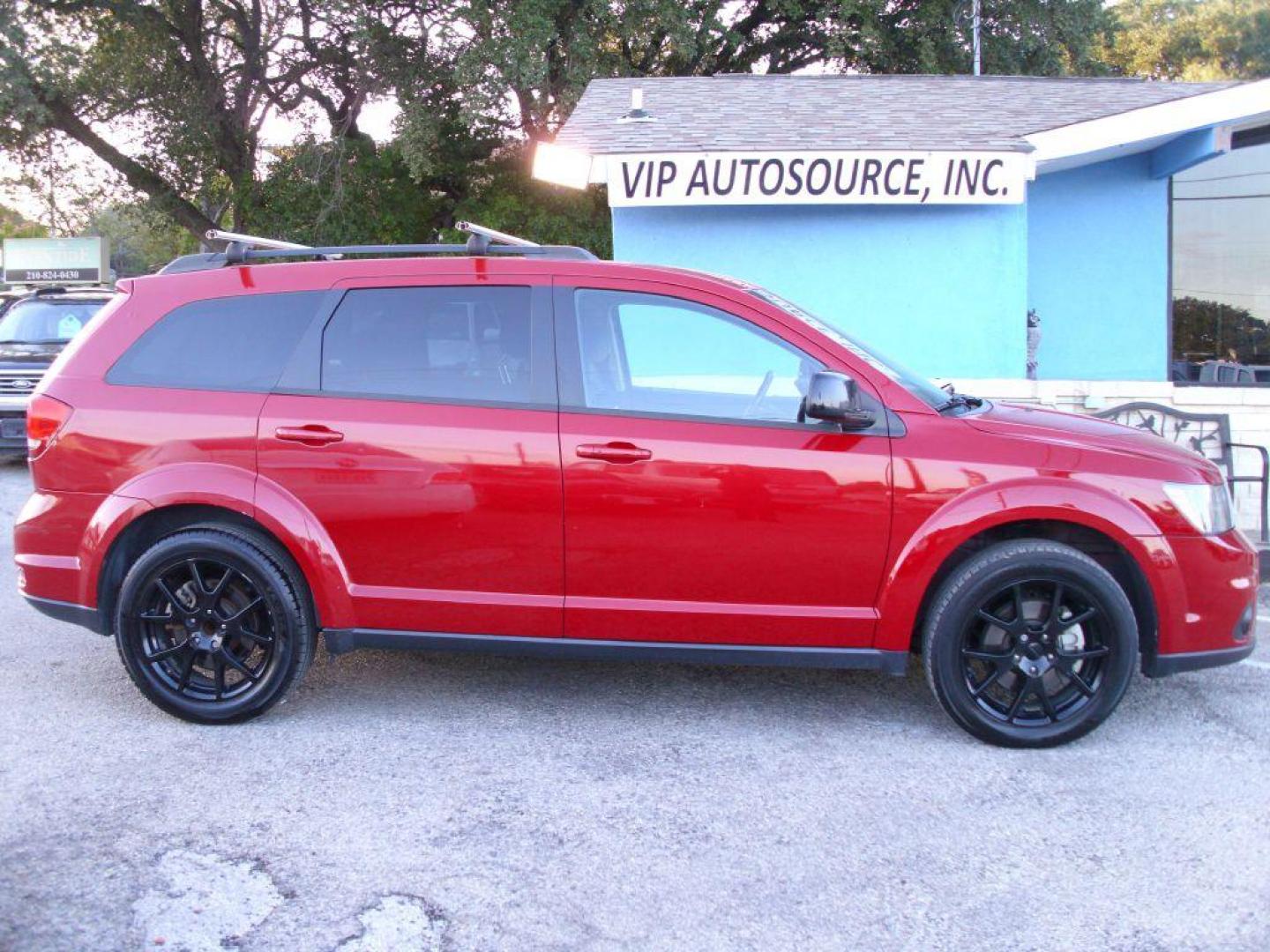 2016 RED DODGE JOURNEY SXT (3C4PDCBB4GT) with an 2.4L engine, Automatic transmission, located at 2215 Harry Wurzbach Rd , San Antonio, TX, 78209, (208) 269-7240, 29.491415, -98.432098 - ONE OWNER- THIRD ROW SEATING; Roof Rack, Traction Control; Air Conditioning; Power Door Locks; Power Steering; AM/FM Stereo; Alloy Wheels; Cruise Control; Side Air Bags; Power Seat; Power Windows; Dual Air Bags ** WE DO NOT OFFER BUY HERE PAY HERE FINANCING. or Sub-Prime credit rebuilding** - Photo#3