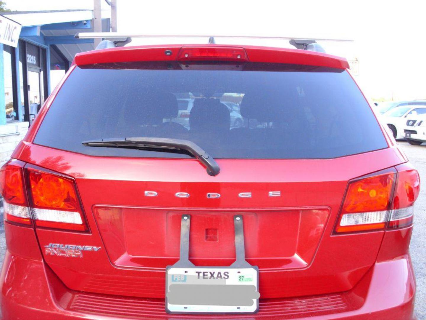 2016 RED DODGE JOURNEY SXT (3C4PDCBB4GT) with an 2.4L engine, Automatic transmission, located at 2215 Harry Wurzbach Rd , San Antonio, TX, 78209, (208) 269-7240, 29.491415, -98.432098 - ONE OWNER- THIRD ROW SEATING; Roof Rack, Traction Control; Air Conditioning; Power Door Locks; Power Steering; AM/FM Stereo; Alloy Wheels; Cruise Control; Side Air Bags; Power Seat; Power Windows; Dual Air Bags ** WE DO NOT OFFER BUY HERE PAY HERE FINANCING. or Sub-Prime credit rebuilding** - Photo#5