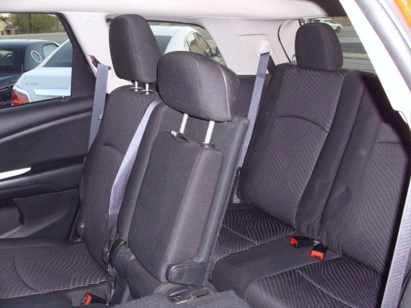 2016 RED DODGE JOURNEY SXT SXT (3C4PDCBB4GT) , Automatic transmission, located at 2215 Harry Wurzbach Rd , San Antonio, TX, 78209, (208) 269-7240, 29.491415, -98.432098 - ONE OWNER- THIRD ROW SEATING; Roof Rack, Traction Control; Air Conditioning; Power Door Locks; Power Steering; AM/FM Stereo; Alloy Wheels; Cruise Control; Side Air Bags; Power Seat; Power Windows; Dual Air Bags ** WE DO NOT OFFER BUY HERE PAY HERE FINANCING. or Sub-Prime credit rebuilding** - Photo#19