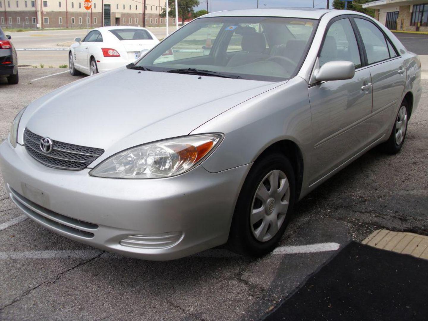 2002 SILVER TOYOTA CAMRY LE (4T1BE32K72U) with an 2.4L engine, Automatic transmission - GREAT VEHICLE WITH AUTOMATIC TRANSMISSION. Air Conditioning; Cruise Control; Sunroof(s); Cloth Seats; Rear Defroster; Power Windows; Power Locks; Power Steering; Tilt Wheel; AM/FM CD; AM/FM Cassette; Available; Dual Front Air Bag; Active Belts; All Wheel ABS We provide financing options through v - Photo#2