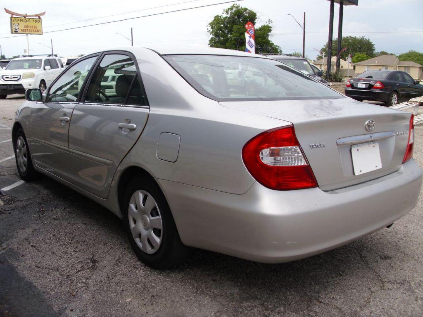 2002 SILVER TOYOTA CAMRY LE (4T1BE32K72U) with an 2.4L engine, Automatic transmission - GREAT VEHICLE WITH AUTOMATIC TRANSMISSION. Air Conditioning; Cruise Control; Sunroof(s); Cloth Seats; Rear Defroster; Power Windows; Power Locks; Power Steering; Tilt Wheel; AM/FM CD; AM/FM Cassette; Available; Dual Front Air Bag; Active Belts; All Wheel ABS We provide financing options through v - Photo#6
