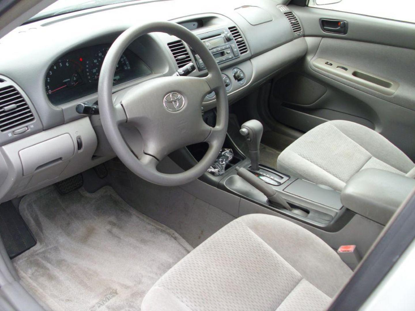 2002 SILVER TOYOTA CAMRY LE (4T1BE32K72U) with an 2.4L engine, Automatic transmission - GREAT VEHICLE WITH AUTOMATIC TRANSMISSION. Air Conditioning; Cruise Control; Sunroof(s); Cloth Seats; Rear Defroster; Power Windows; Power Locks; Power Steering; Tilt Wheel; AM/FM CD; AM/FM Cassette; Available; Dual Front Air Bag; Active Belts; All Wheel ABS We provide financing options through v - Photo#7