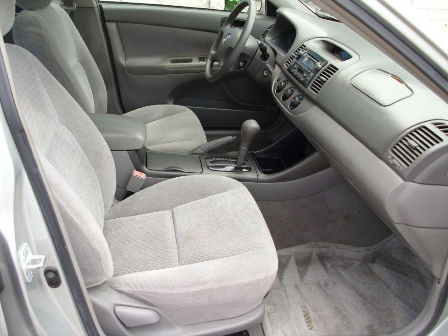 2002 SILVER TOYOTA CAMRY LE (4T1BE32K72U) with an 2.4L engine, Automatic transmission - GREAT VEHICLE WITH AUTOMATIC TRANSMISSION. Air Conditioning; Cruise Control; Sunroof(s); Cloth Seats; Rear Defroster; Power Windows; Power Locks; Power Steering; Tilt Wheel; AM/FM CD; AM/FM Cassette; Available; Dual Front Air Bag; Active Belts; All Wheel ABS We provide financing options through v - Photo#9