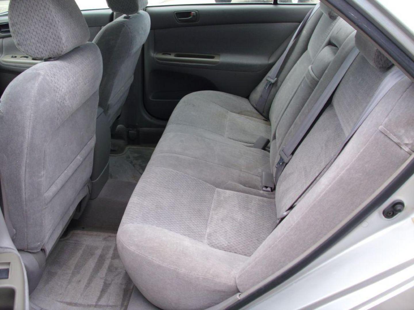 2002 SILVER TOYOTA CAMRY LE (4T1BE32K72U) with an 2.4L engine, Automatic transmission - GREAT VEHICLE WITH AUTOMATIC TRANSMISSION. Air Conditioning; Cruise Control; Sunroof(s); Cloth Seats; Rear Defroster; Power Windows; Power Locks; Power Steering; Tilt Wheel; AM/FM CD; AM/FM Cassette; Available; Dual Front Air Bag; Active Belts; All Wheel ABS We provide financing options through v - Photo#14