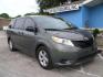 2013 GREEN TOYOTA SIENNA L (5TDZK3DCXDS) with an 3.5L engine, Automatic transmission, located at 2215 Harry Wurzbach Rd , San Antonio, TX, 78209, (208) 269-7240, 29.491415, -98.432098 - ONE OWNER- GREAT FOR FAMILIES and TRAVELING!! Quad Seats; Automatic Transmission; Third Row Seats; Rear Defroster; Traction Control; Cloth Seats; Power Locks; Rear Air Conditioning; Air Conditioning; Power Windows; Power Locks; Power Steering; Tilt Wheel; AM/FM CD/MP3; Satellite; AM/FM CD/DVD; Imm - Photo#1