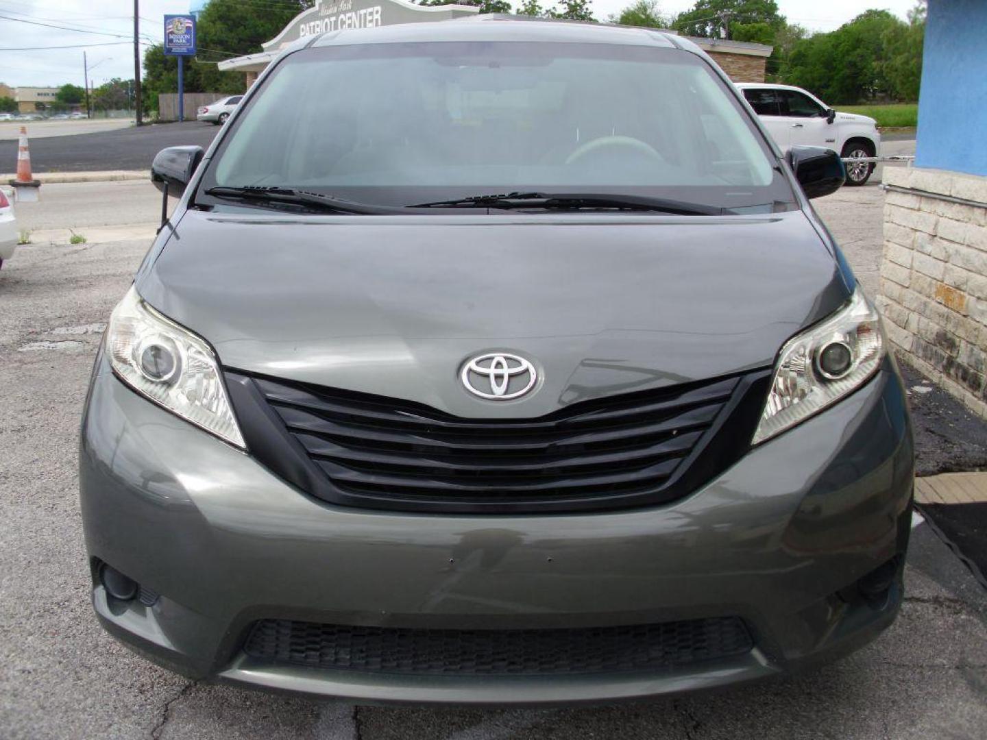 2013 GREEN TOYOTA SIENNA L (5TDZK3DCXDS) with an 3.5L engine, Automatic transmission, located at 2215 Harry Wurzbach Rd , San Antonio, TX, 78209, (208) 269-7240, 29.491415, -98.432098 - ONE OWNER- GREAT FOR FAMILIES and TRAVELING!! Quad Seats; Automatic Transmission; Third Row Seats; Rear Defroster; Traction Control; Cloth Seats; Power Locks; Rear Air Conditioning; Air Conditioning; Power Windows; Power Locks; Power Steering; Tilt Wheel; AM/FM CD/MP3; Satellite; AM/FM CD/DVD; Imm - Photo#3