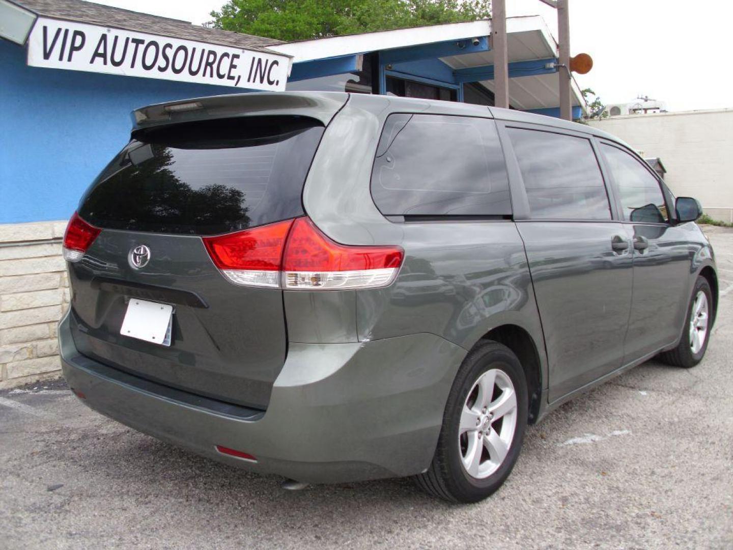 2013 GREEN TOYOTA SIENNA L (5TDZK3DCXDS) with an 3.5L engine, Automatic transmission, located at 2215 Harry Wurzbach Rd , San Antonio, TX, 78209, (208) 269-7240, 29.491415, -98.432098 - ONE OWNER- GREAT FOR FAMILIES and TRAVELING!! Quad Seats; Automatic Transmission; Third Row Seats; Rear Defroster; Traction Control; Cloth Seats; Power Locks; Rear Air Conditioning; Air Conditioning; Power Windows; Power Locks; Power Steering; Tilt Wheel; AM/FM CD/MP3; Satellite; AM/FM CD/DVD; Imm - Photo#4