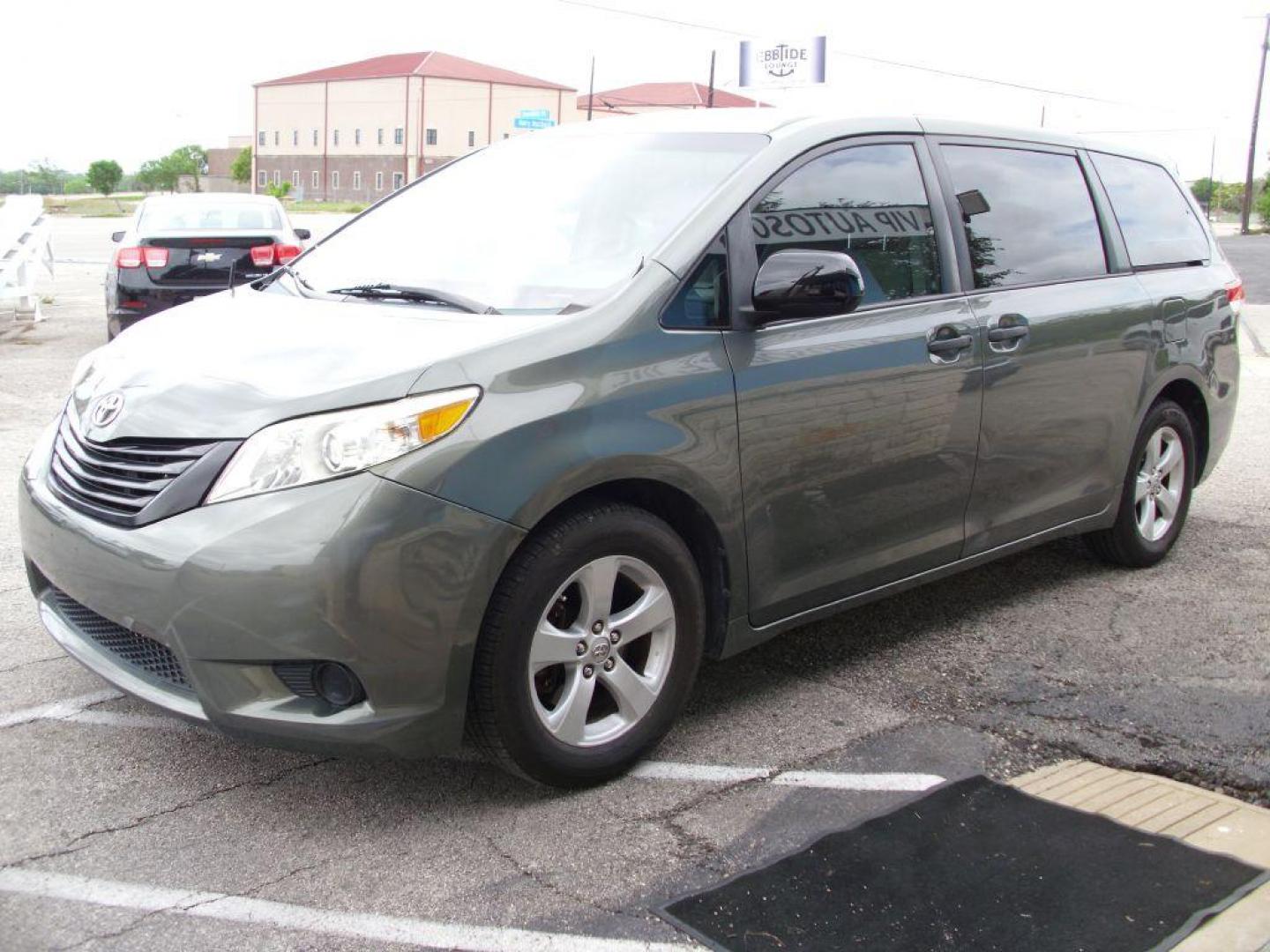 2013 GREEN TOYOTA SIENNA L (5TDZK3DCXDS) with an 3.5L engine, Automatic transmission, located at 2215 Harry Wurzbach Rd , San Antonio, TX, 78209, (208) 269-7240, 29.491415, -98.432098 - ONE OWNER- GREAT FOR FAMILIES and TRAVELING!! Quad Seats; Automatic Transmission; Third Row Seats; Rear Defroster; Traction Control; Cloth Seats; Power Locks; Rear Air Conditioning; Air Conditioning; Power Windows; Power Locks; Power Steering; Tilt Wheel; AM/FM CD/MP3; Satellite; AM/FM CD/DVD; Imm - Photo#6