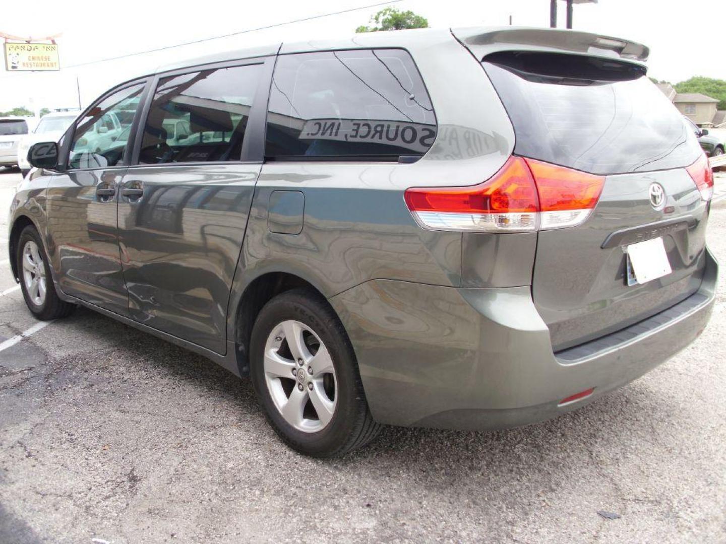 2013 GREEN TOYOTA SIENNA L (5TDZK3DCXDS) with an 3.5L engine, Automatic transmission, located at 2215 Harry Wurzbach Rd , San Antonio, TX, 78209, (208) 269-7240, 29.491415, -98.432098 - ONE OWNER- GREAT FOR FAMILIES and TRAVELING!! Quad Seats; Automatic Transmission; Third Row Seats; Rear Defroster; Traction Control; Cloth Seats; Power Locks; Rear Air Conditioning; Air Conditioning; Power Windows; Power Locks; Power Steering; Tilt Wheel; AM/FM CD/MP3; Satellite; AM/FM CD/DVD; Imm - Photo#7
