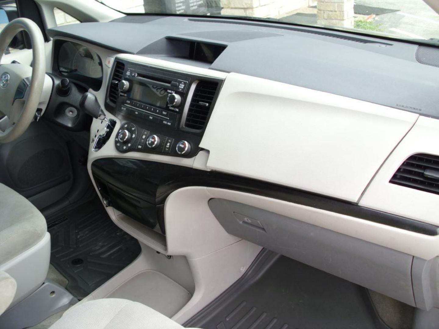 2013 GREEN TOYOTA SIENNA L (5TDZK3DCXDS) with an 3.5L engine, Automatic transmission, located at 2215 Harry Wurzbach Rd , San Antonio, TX, 78209, (208) 269-7240, 29.491415, -98.432098 - ONE OWNER- GREAT FOR FAMILIES and TRAVELING!! Quad Seats; Automatic Transmission; Third Row Seats; Rear Defroster; Traction Control; Cloth Seats; Power Locks; Rear Air Conditioning; Air Conditioning; Power Windows; Power Locks; Power Steering; Tilt Wheel; AM/FM CD/MP3; Satellite; AM/FM CD/DVD; Imm - Photo#12