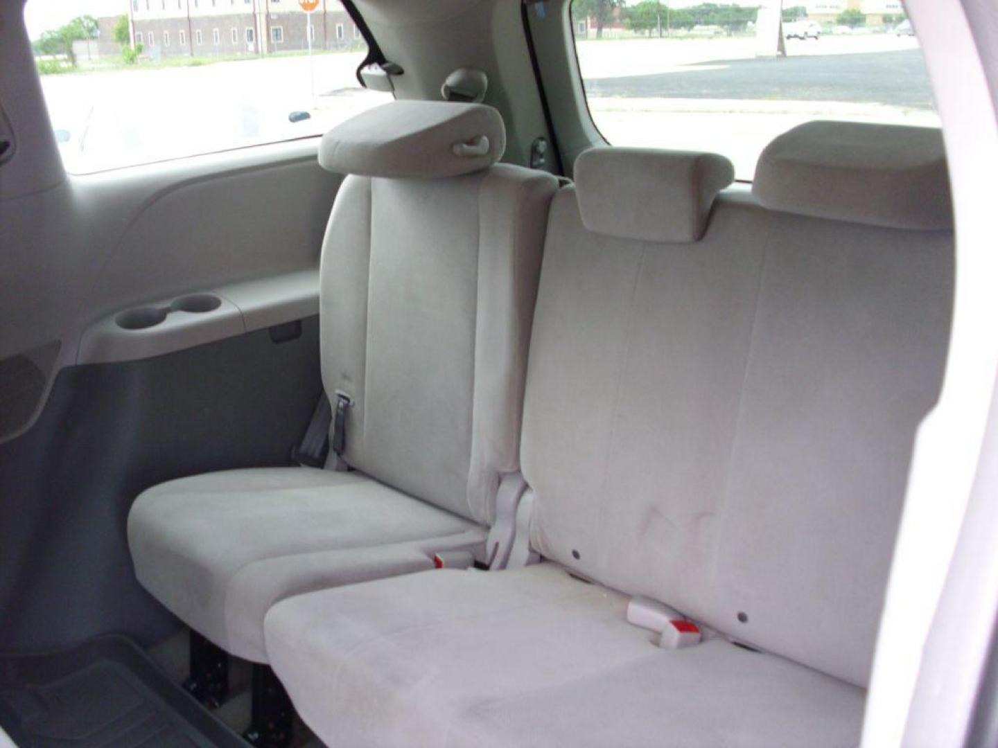 2013 GREEN TOYOTA SIENNA L (5TDZK3DCXDS) with an 3.5L engine, Automatic transmission, located at 2215 Harry Wurzbach Rd , San Antonio, TX, 78209, (208) 269-7240, 29.491415, -98.432098 - ONE OWNER- GREAT FOR FAMILIES and TRAVELING!! Quad Seats; Automatic Transmission; Third Row Seats; Rear Defroster; Traction Control; Cloth Seats; Power Locks; Rear Air Conditioning; Air Conditioning; Power Windows; Power Locks; Power Steering; Tilt Wheel; AM/FM CD/MP3; Satellite; AM/FM CD/DVD; Imm - Photo#16