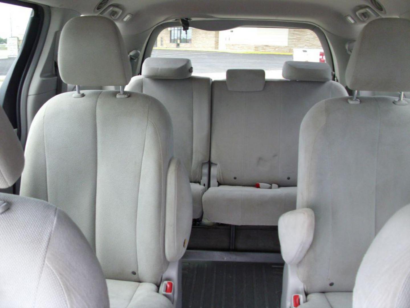 2013 GREEN TOYOTA SIENNA L (5TDZK3DCXDS) with an 3.5L engine, Automatic transmission, located at 2215 Harry Wurzbach Rd , San Antonio, TX, 78209, (208) 269-7240, 29.491415, -98.432098 - ONE OWNER- GREAT FOR FAMILIES and TRAVELING!! Quad Seats; Automatic Transmission; Third Row Seats; Rear Defroster; Traction Control; Cloth Seats; Power Locks; Rear Air Conditioning; Air Conditioning; Power Windows; Power Locks; Power Steering; Tilt Wheel; AM/FM CD/MP3; Satellite; AM/FM CD/DVD; Imm - Photo#21