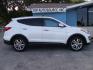 2014 WHITE HYUNDAI SANTA FE SPORT (5XYZUDLA7EG) with an 2.0L engine, Automatic transmission, located at 2215 Harry Wurzbach Rd , San Antonio, TX, 78209, (208) 269-7240, 29.491415, -98.432098 - 4 WHEEL DRIVE WITH ALLOY WHEELS! TURBO CHARGED ENGINE!! Blind Spot Monitor; Leather Seats; Bluetooth Technology; Front Seat Heaters; Full Roof Rack; Infinity Sound System; Navigation System; Rear Defroster; Rear Sunshade; Rear View Camera; Air Conditioning; Power Windows; Power Locks; Power Steering - Photo#0