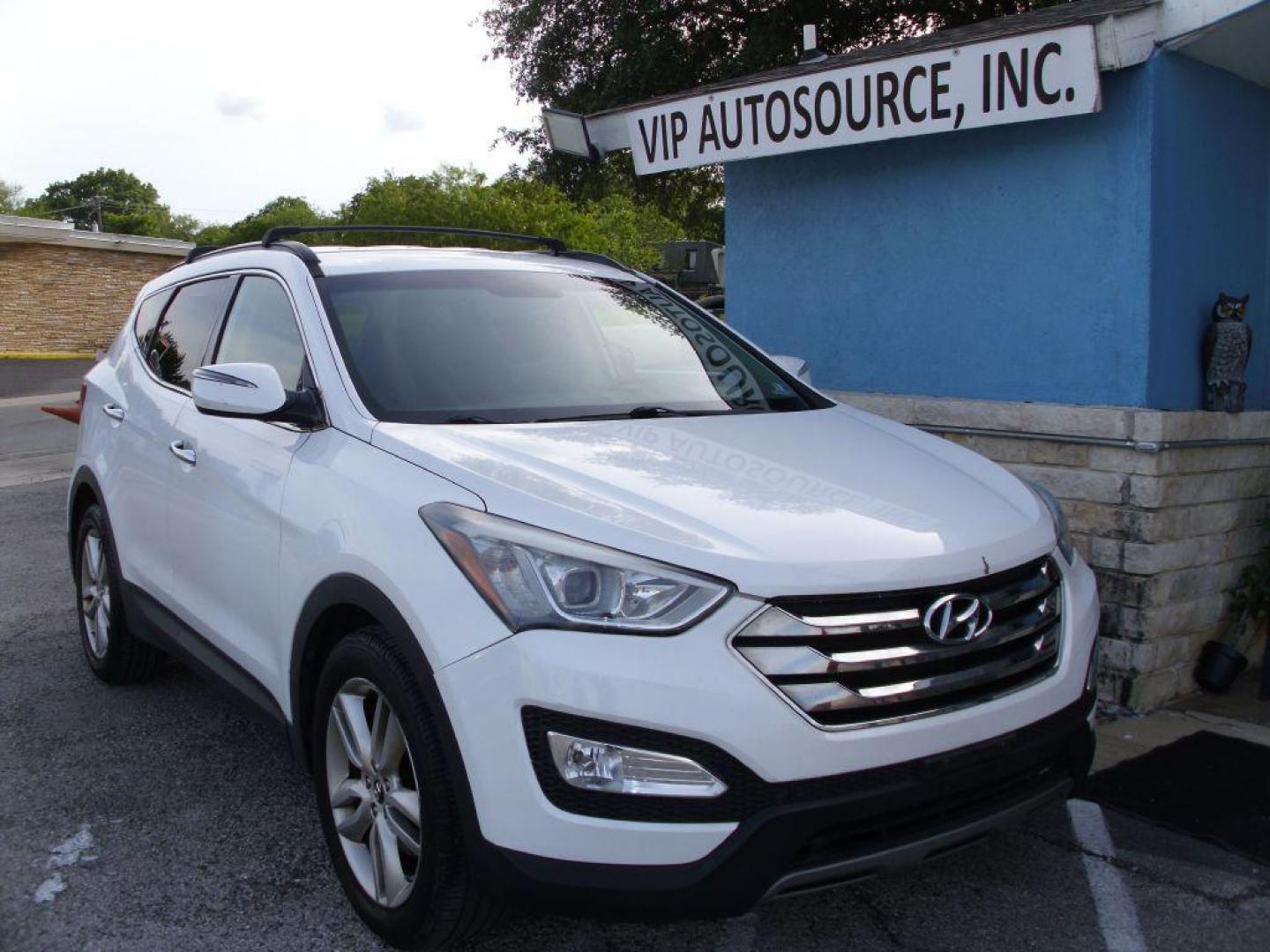 2014 WHITE HYUNDAI SANTA FE SPORT (5XYZUDLA7EG) with an 2.0L engine, Automatic transmission, located at 2215 Harry Wurzbach Rd , San Antonio, TX, 78209, (208) 269-7240, 29.491415, -98.432098 - 4 WHEEL DRIVE WITH ALLOY WHEELS! TURBO CHARGED ENGINE!! Blind Spot Monitor; Leather Seats; Bluetooth Technology; Front Seat Heaters; Full Roof Rack; Infinity Sound System; Navigation System; Rear Defroster; Rear Sunshade; Rear View Camera; Air Conditioning; Power Windows; Power Locks; Power Steering - Photo#1