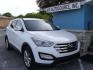 2014 WHITE HYUNDAI SANTA FE SPORT (5XYZUDLA7EG) with an 2.0L engine, Automatic transmission, located at 2215 Harry Wurzbach Rd , San Antonio, TX, 78209, (208) 269-7240, 29.491415, -98.432098 - 4 WHEEL DRIVE WITH ALLOY WHEELS! TURBO CHARGED ENGINE!! Blind Spot Monitor; Leather Seats; Bluetooth Technology; Front Seat Heaters; Full Roof Rack; Infinity Sound System; Navigation System; Rear Defroster; Rear Sunshade; Rear View Camera; Air Conditioning; Power Windows; Power Locks; Power Steering - Photo#1