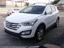 2014 WHITE HYUNDAI SANTA FE SPORT (5XYZUDLA7EG) with an 2.0L engine, Automatic transmission, located at 2215 Harry Wurzbach Rd , San Antonio, TX, 78209, (208) 269-7240, 29.491415, -98.432098 - 4 WHEEL DRIVE WITH ALLOY WHEELS! TURBO CHARGED ENGINE!! Blind Spot Monitor; Leather Seats; Bluetooth Technology; Front Seat Heaters; Full Roof Rack; Infinity Sound System; Navigation System; Rear Defroster; Rear Sunshade; Rear View Camera; Air Conditioning; Power Windows; Power Locks; Power Steering - Photo#2