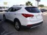 2014 WHITE HYUNDAI SANTA FE SPORT (5XYZUDLA7EG) with an 2.0L engine, Automatic transmission, located at 2215 Harry Wurzbach Rd , San Antonio, TX, 78209, (208) 269-7240, 29.491415, -98.432098 - 4 WHEEL DRIVE WITH ALLOY WHEELS! TURBO CHARGED ENGINE!! Blind Spot Monitor; Leather Seats; Bluetooth Technology; Front Seat Heaters; Full Roof Rack; Infinity Sound System; Navigation System; Rear Defroster; Rear Sunshade; Rear View Camera; Air Conditioning; Power Windows; Power Locks; Power Steering - Photo#6