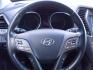 2014 WHITE HYUNDAI SANTA FE SPORT (5XYZUDLA7EG) with an 2.0L engine, Automatic transmission, located at 2215 Harry Wurzbach Rd , San Antonio, TX, 78209, (208) 269-7240, 29.491415, -98.432098 - 4 WHEEL DRIVE WITH ALLOY WHEELS! TURBO CHARGED ENGINE!! Blind Spot Monitor; Leather Seats; Bluetooth Technology; Front Seat Heaters; Full Roof Rack; Infinity Sound System; Navigation System; Rear Defroster; Rear Sunshade; Rear View Camera; Air Conditioning; Power Windows; Power Locks; Power Steering - Photo#16